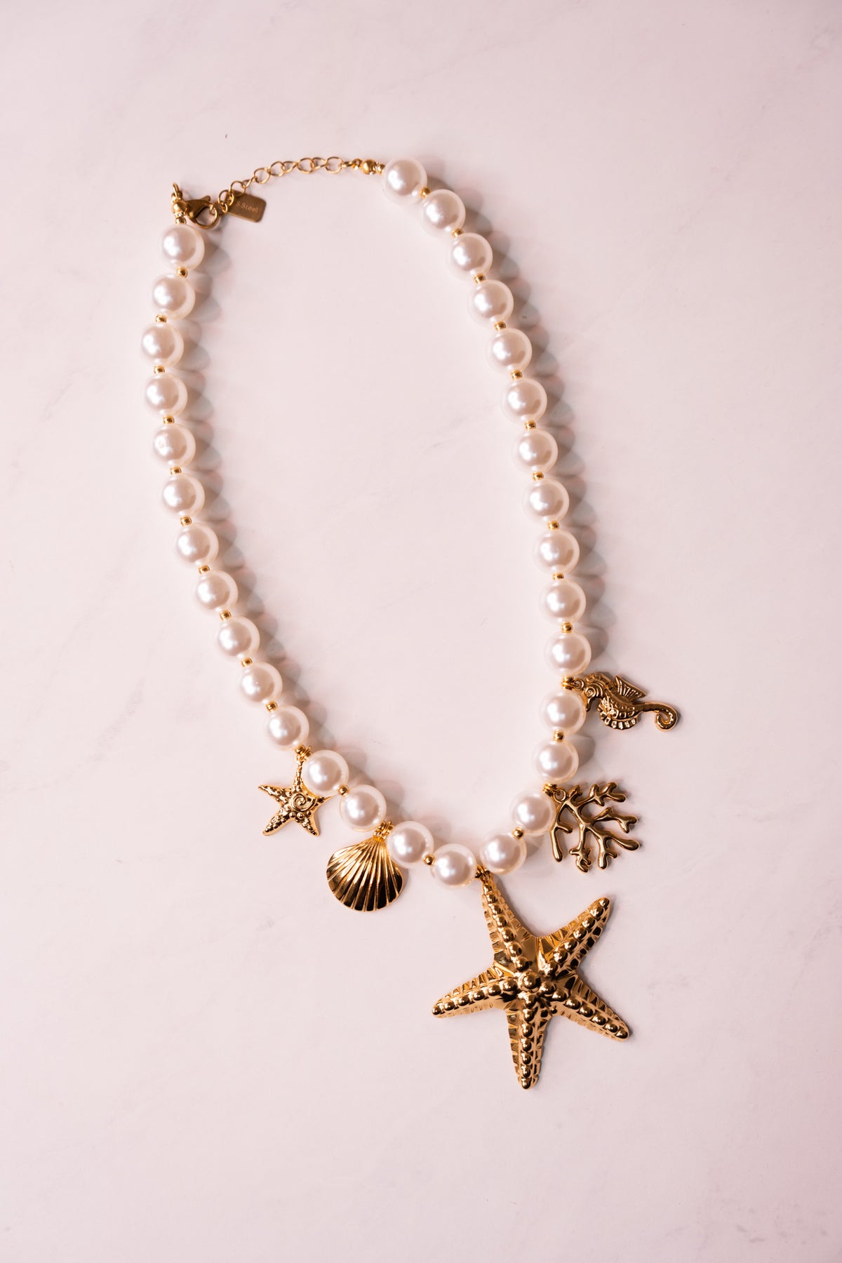Olive White Beaded Starfish Necklace In Gold