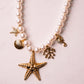 Olive White Beaded Starfish Necklace In Gold