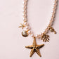 Olive White Beaded Starfish Necklace In Gold
