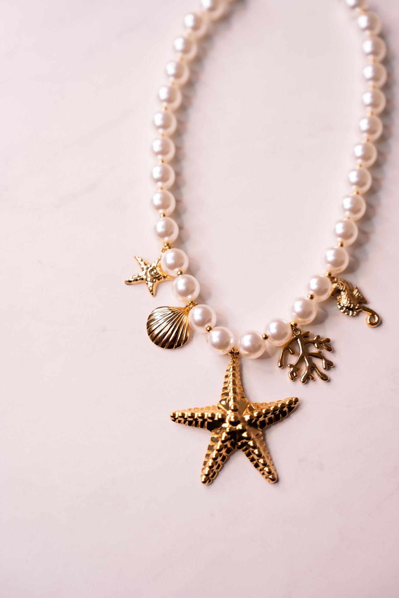 Olive White Beaded Starfish Necklace In Gold