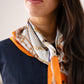 Orla Chain Print Neck Scarf In Orange Mix