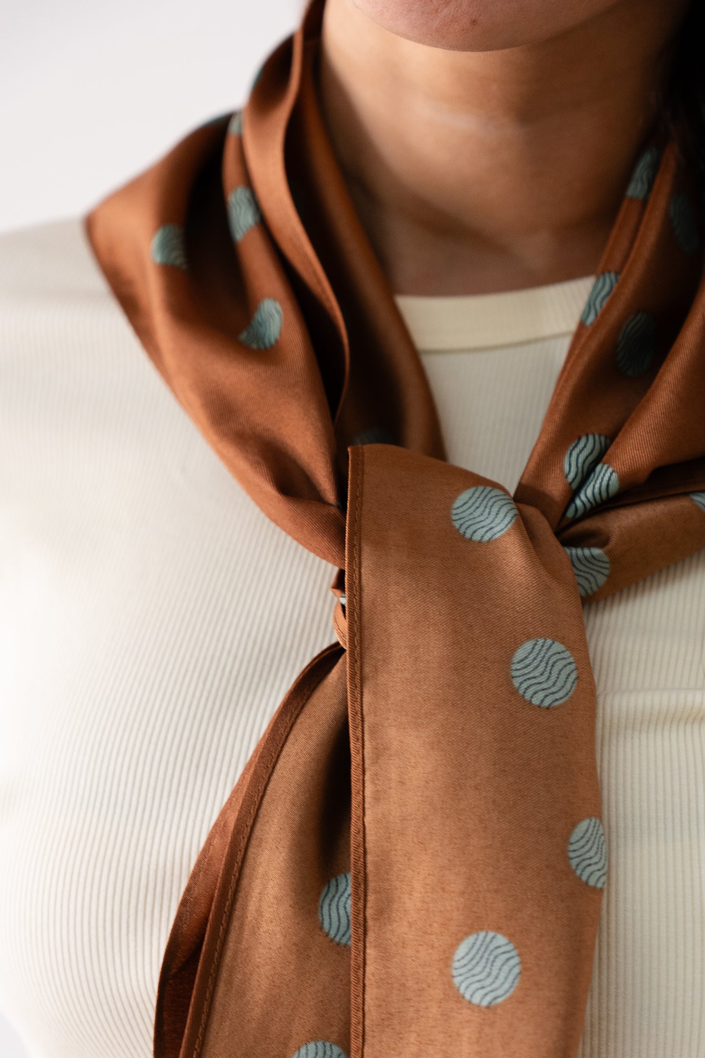 Orla Green Spotted Neck Scarf In Tan