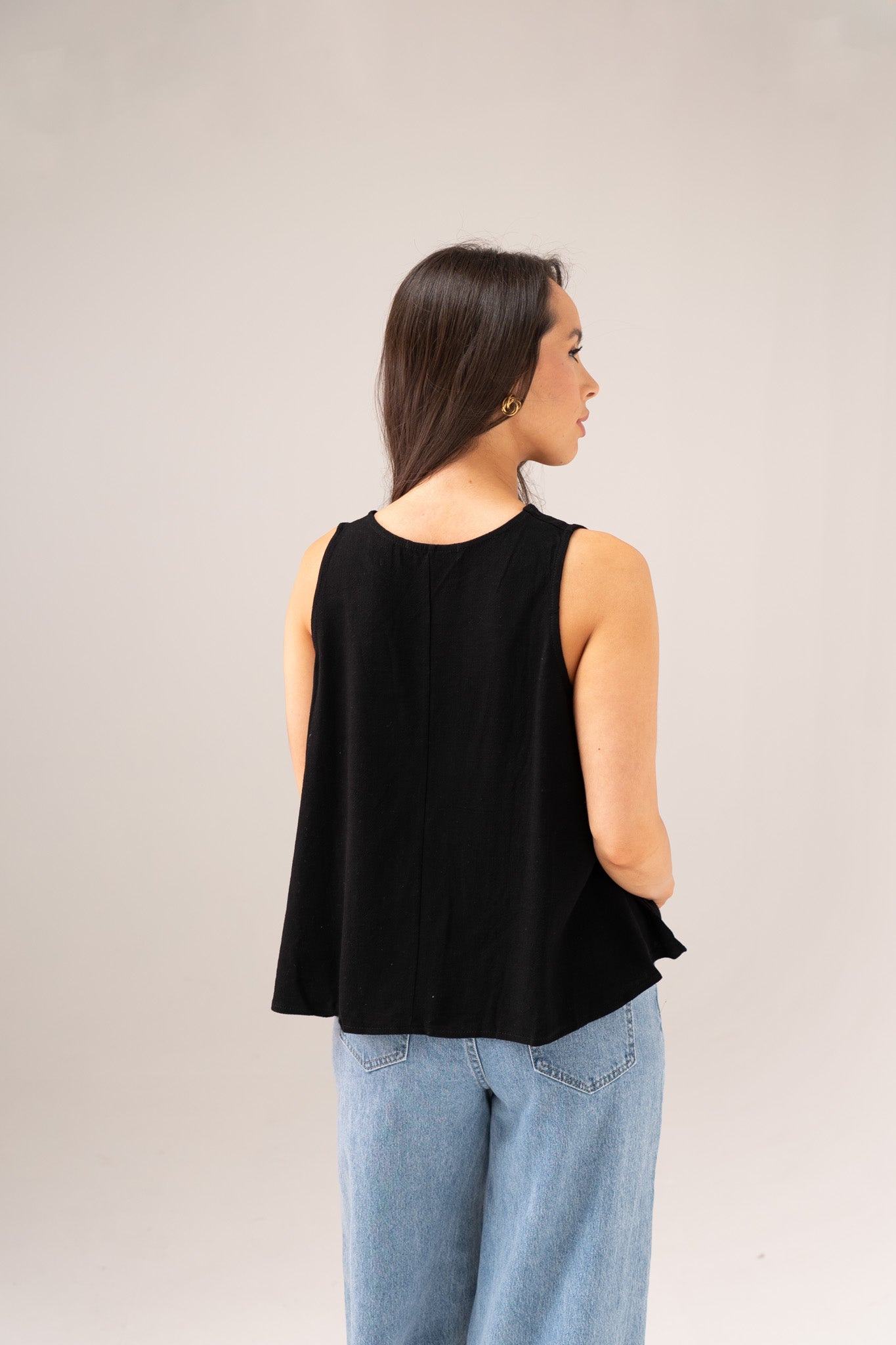 Paige Asymmetric Hem Top In Black