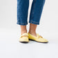Sadie Buckle Faux Leather Loafer In Lemon