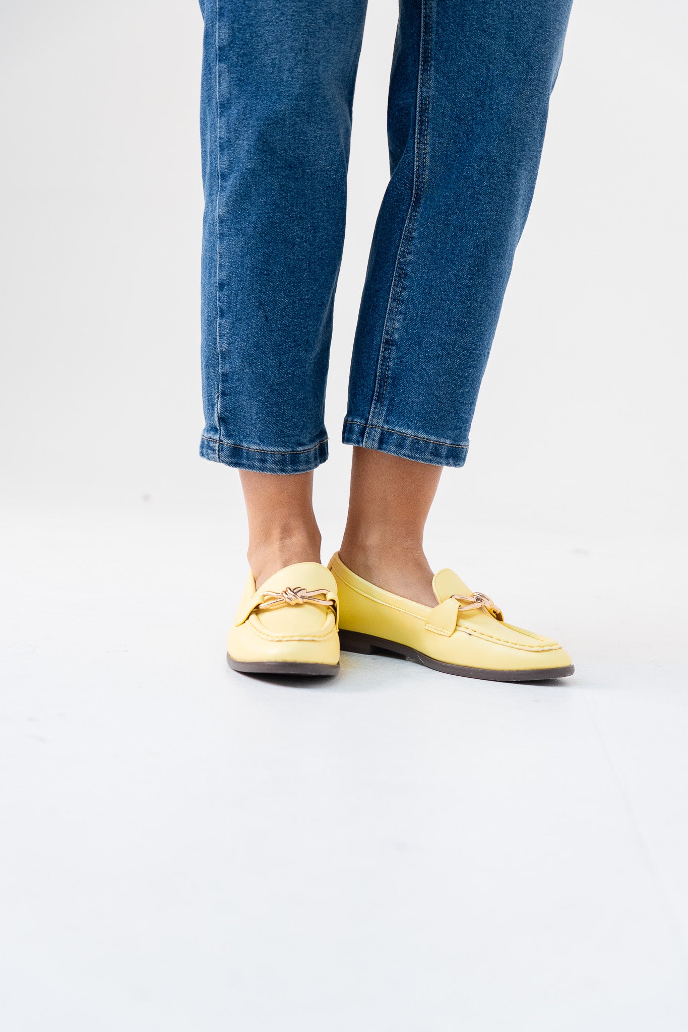 Sadie Buckle Faux Leather Loafer In Lemon