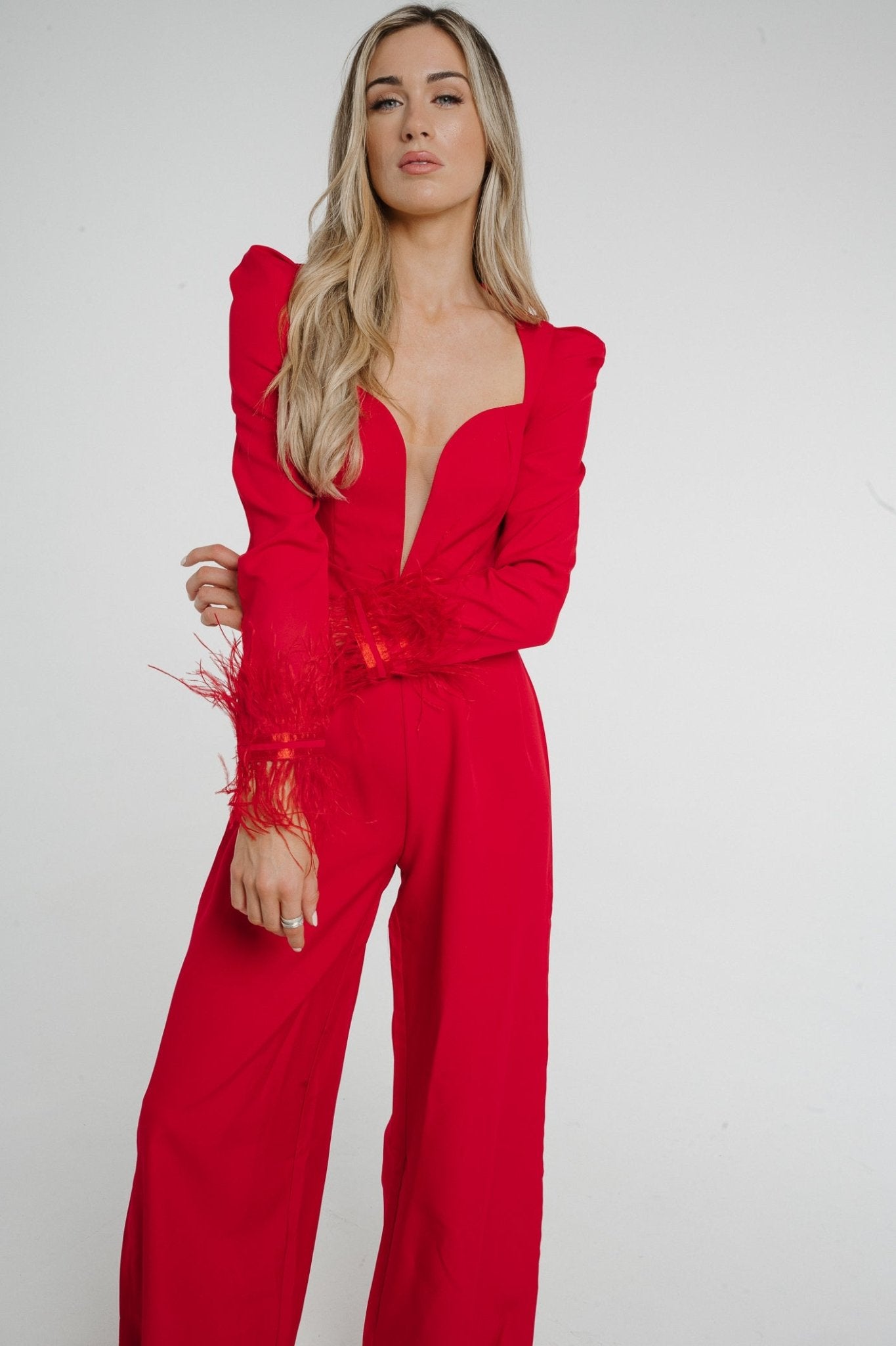 Holly Feather Trim Jumpsuit In Red - The Walk in Wardrobe