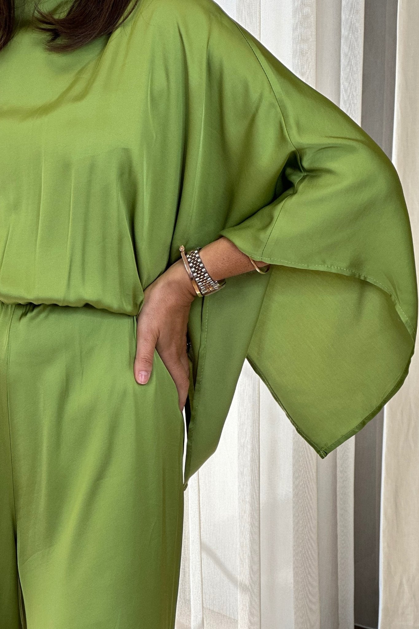 Pia One Sleeve Jumpsuit In Green - The Walk in Wardrobe
