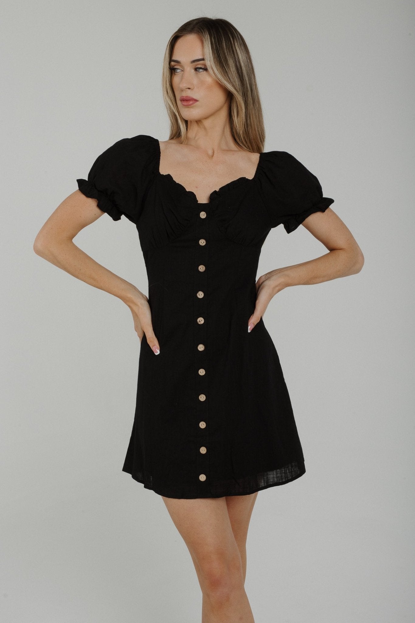 Polly Button Front Ruffle Dress In Black - The Walk in Wardrobe