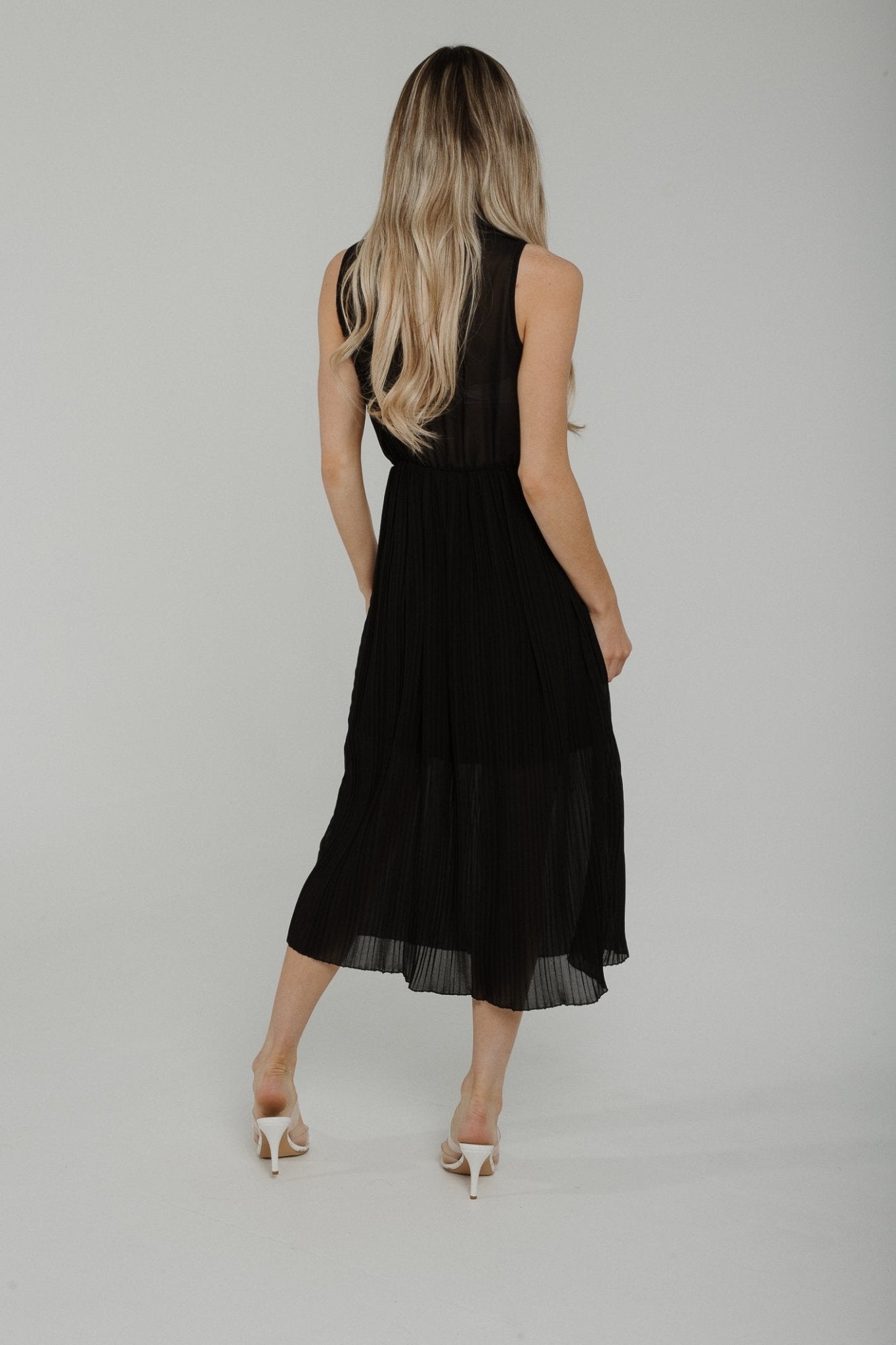 Polly Sleeveless Pleated Dress In Black - The Walk in Wardrobe