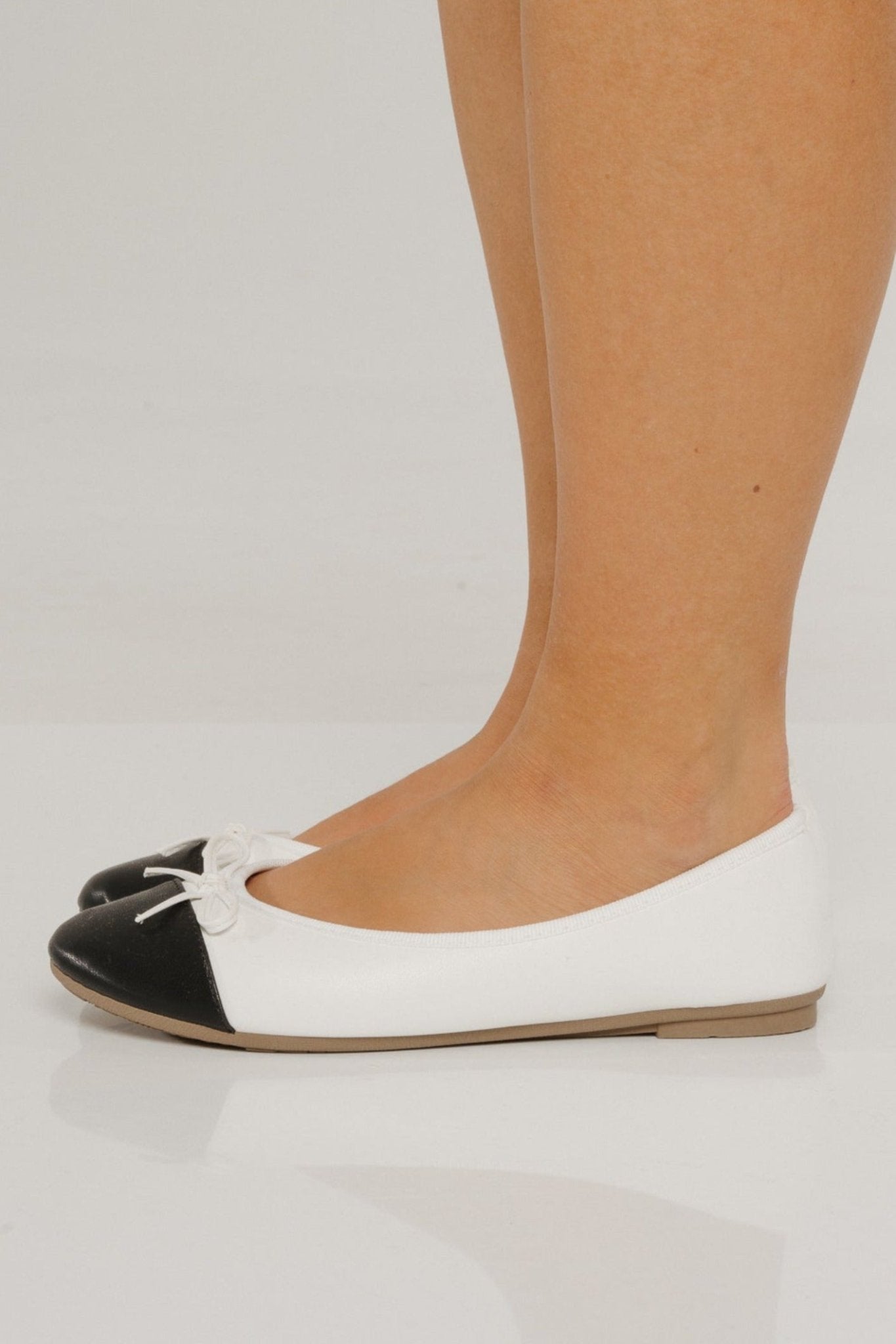 Sadie Black Toe Pumps In White - The Walk in Wardrobe